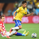 Neymar of Brazil dribbles past Ivan Perisic of Croatia in the first half during the 2014 FIFA World Cup Brazil Group A match between Brazil and Croatia at Arena de Sao Paulo June 12, 2014, in Sao Paulo.
Buda Mendes/Getty Images